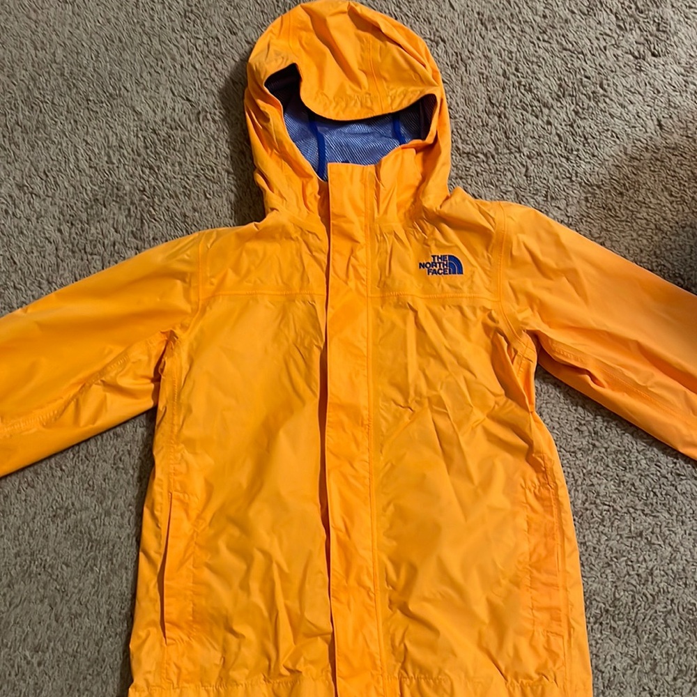 Mesh north face rain coat
orange and blue
